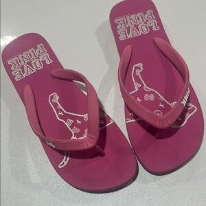 Pink Flip Flops with White Logo